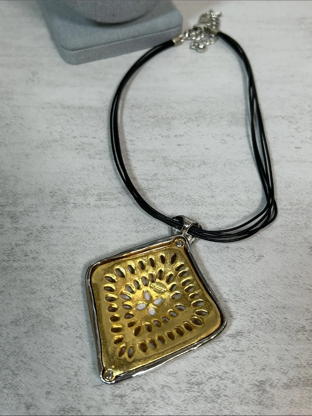 Chico's Gold and Silver Sunburst Pendant Necklace with Black Multi-Strand Cord